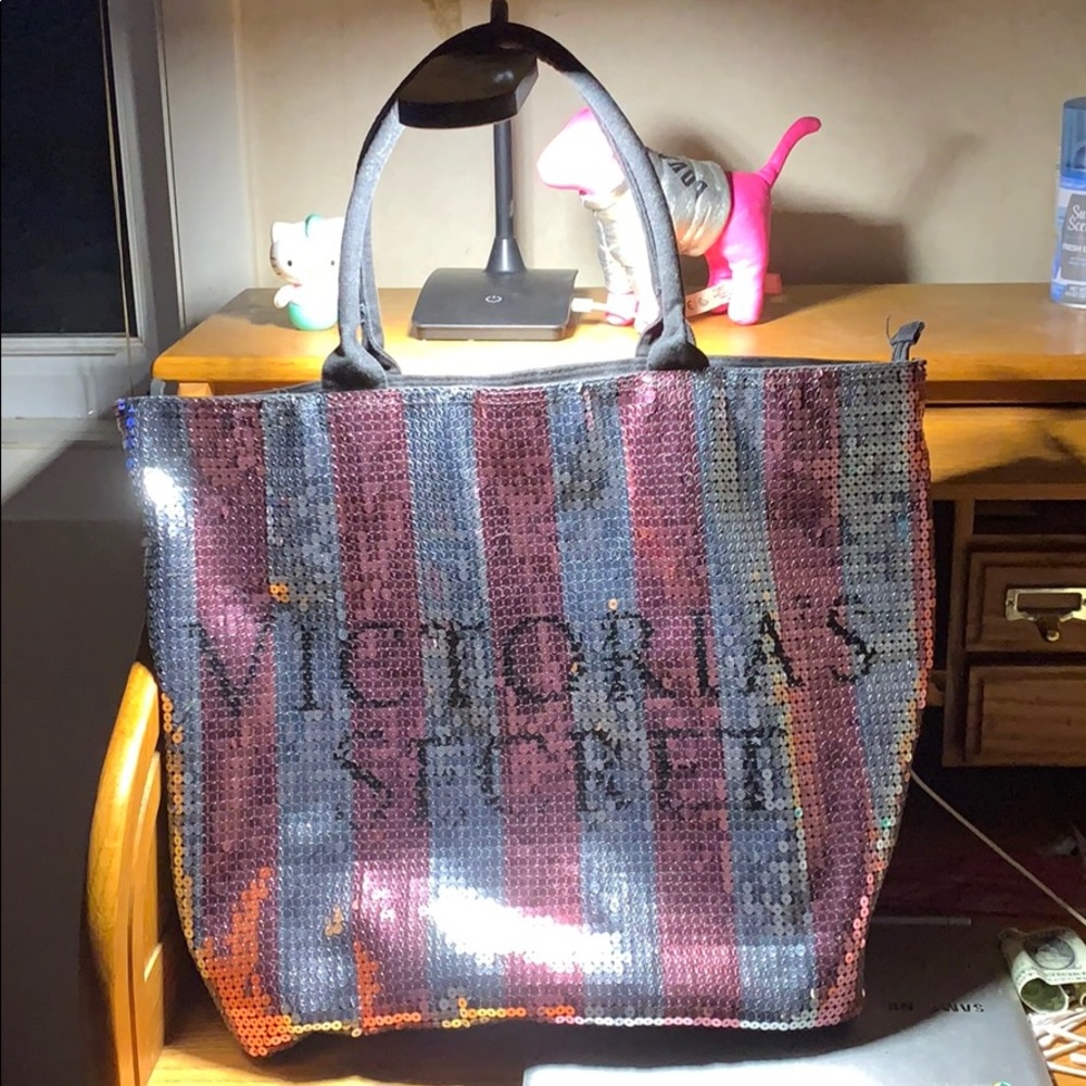 Victoria’s Secret tote bag.